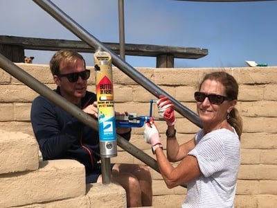 Volunteers putting up a HOTYB ashcan.