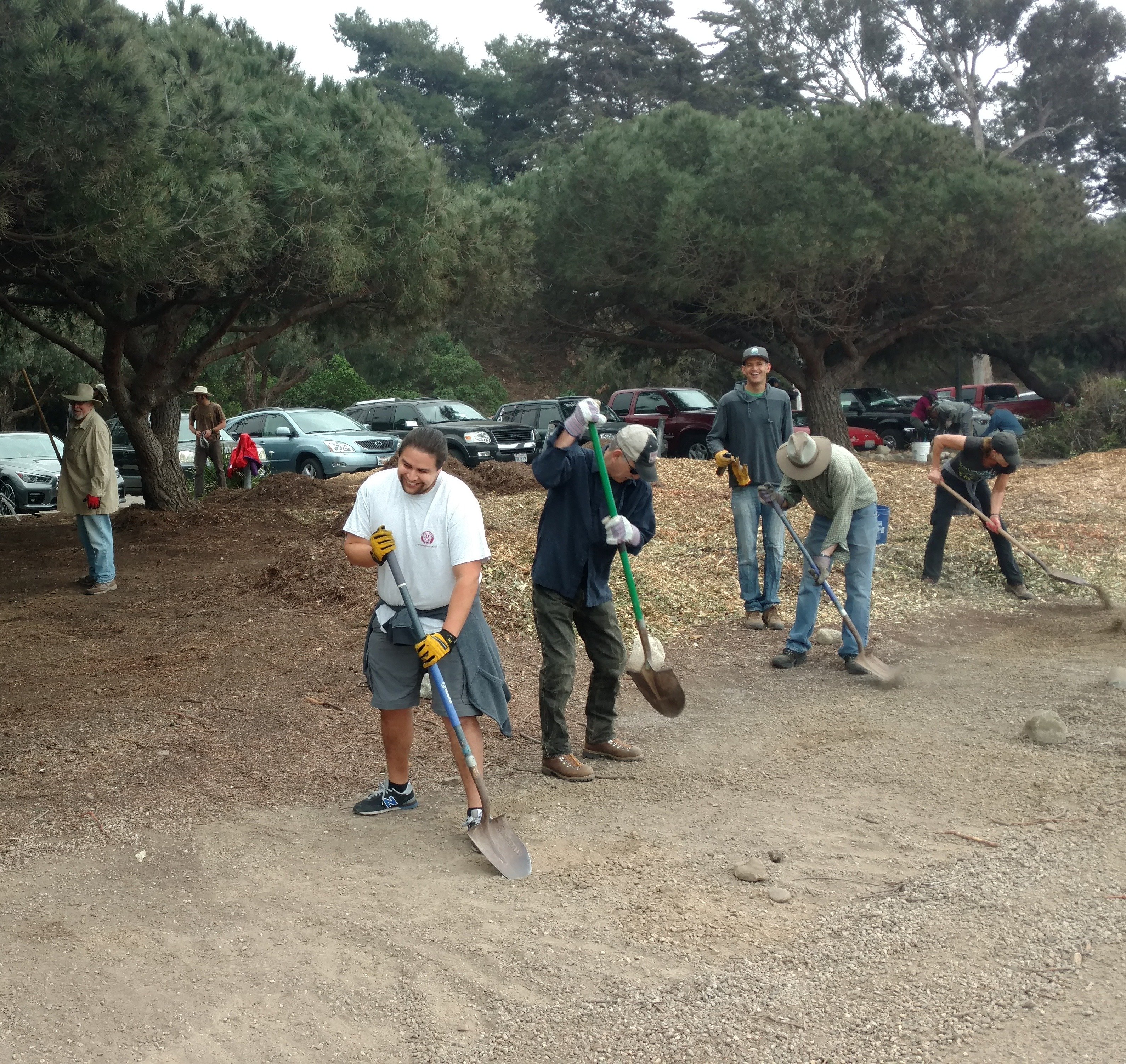 A group of volunteers digging a new Ocean Friendly Garden