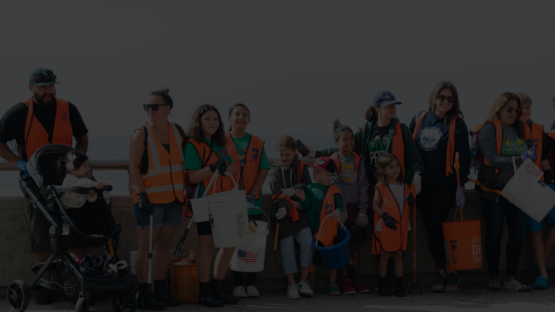 A group of volunteers at a beach cleanup at Ventura Promenade. 